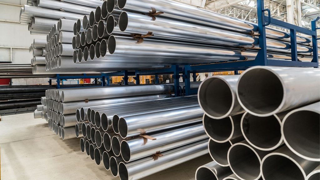 Steel pipe and tube storage racks in warehouse with organized long product handling system